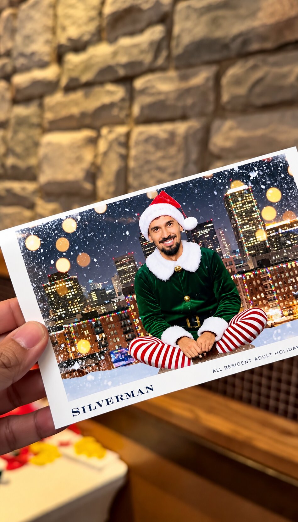 A printed holiday portrait being held up for a closer look