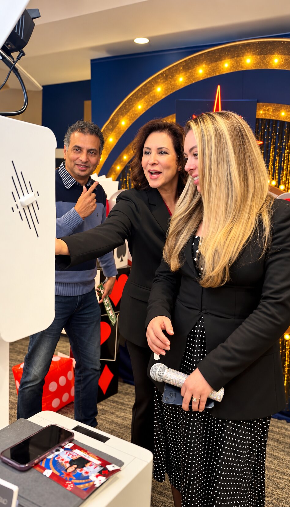 Guests enjoying a casino-themed holiday photo booth