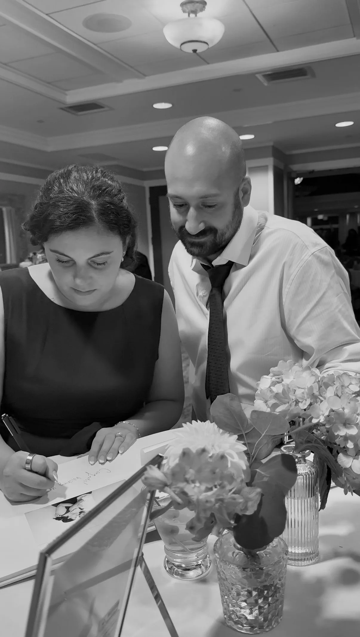 Guests look through prints at the photo station